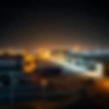 Modern facilities and warehouses in the Al Jurf Industrial Area highlighting development