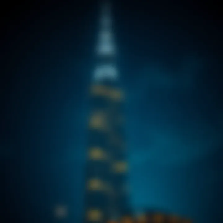 Nighttime illumination of Al Meraikhi Tower, emphasizing its striking presence.