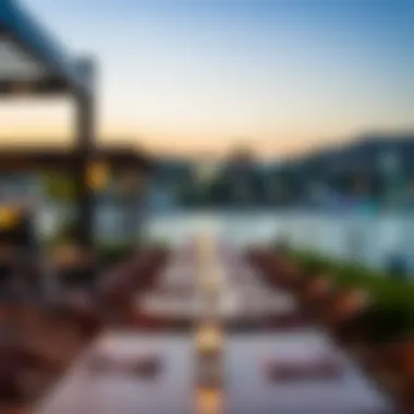 View of outdoor dining spaces with scenic waterfront