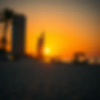 Serene beach with golden hues reflecting on the water during sunset