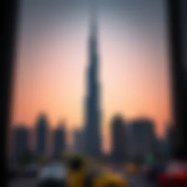 The Burj Khalifa standing tall against the backdrop of a sunset