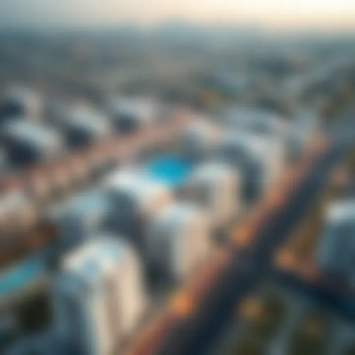 Aerial Perspective of Rakayez Properties in Dubai Aerial view of Dubai showcasing Rakayez properties and skyline