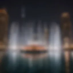 A captivating view of the Dubai Fountain at night, illuminated by colorful lights and synchronized with music.